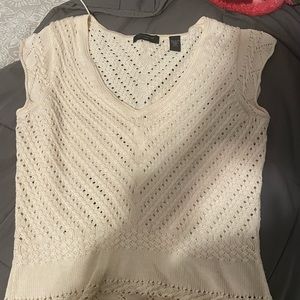 A crocheted white top